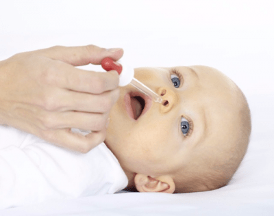 Капают в нос ребенку